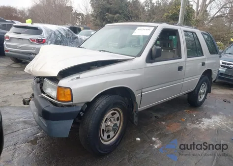 1997 Isuzu Rodeo S 2.6L z USA, uszkodzony, nr VIN 4S2CK58E5V4322383